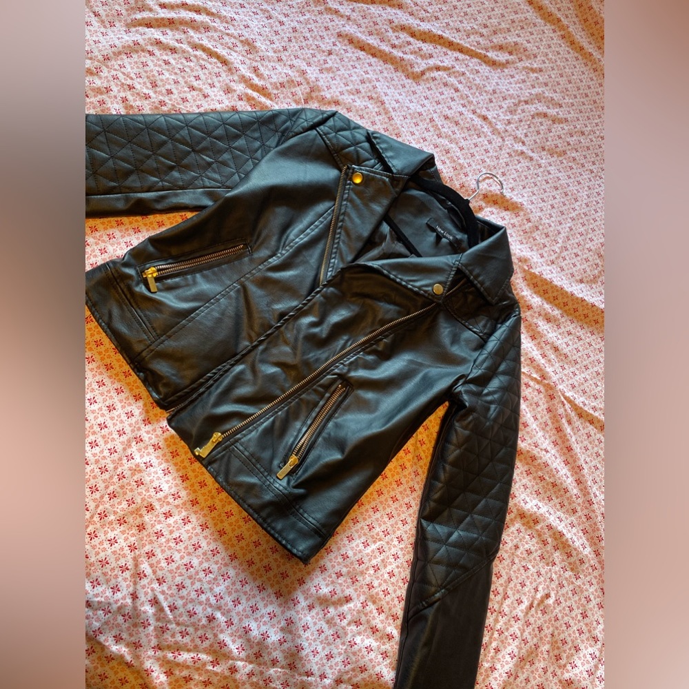 Faux Leather Moto Jacket with Sequinned Hamsa Patch. Black jacket.